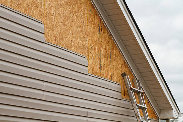 Professional Siding Installation technician working in Naperville, IL